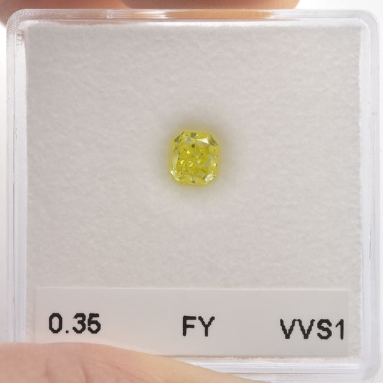 0,35 Karat Fancy Yellow Radiant Diamant VVS1 IGI