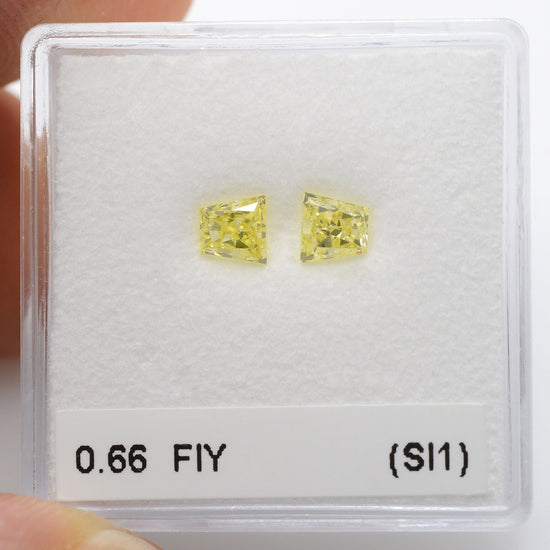 0.66 Carat Fancy Intense Yellow Trapezoid Diamonds (SI1)
