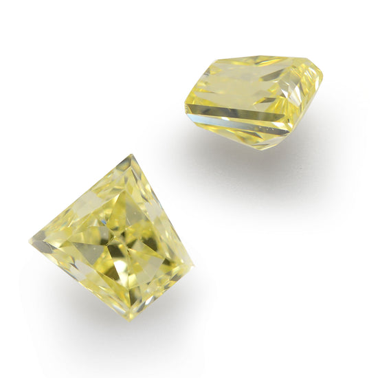0.66 Carat Fancy Intense Yellow Trapezoid Diamonds (SI1)