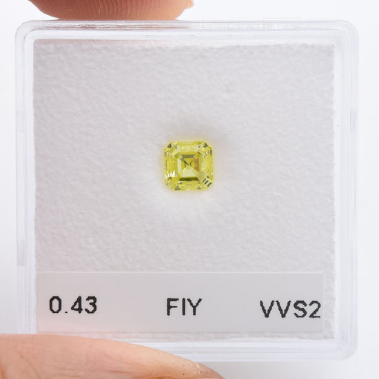 0.43 Carat Fancy Intense Yellow Asscher Diamond VVS2 IGI