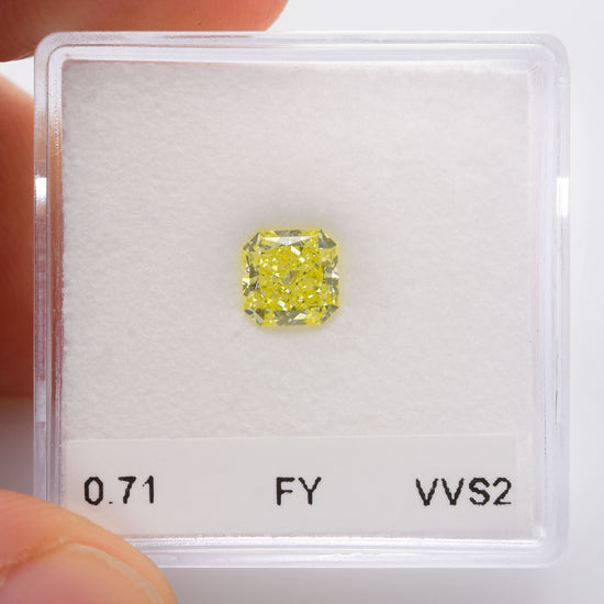 0.71 Carat Fancy Yellow Radiant Diamond VVS2 IGI