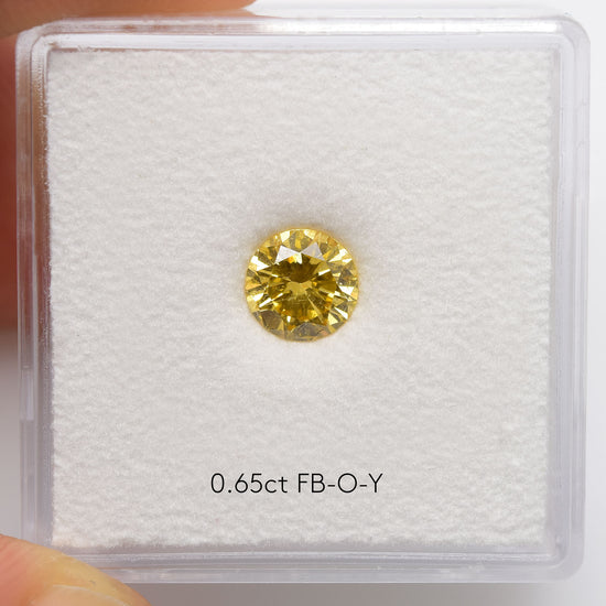0.65 Carat Fancy Brownish Orangy Yellow Round Brilliant Diamond (I1) GIA