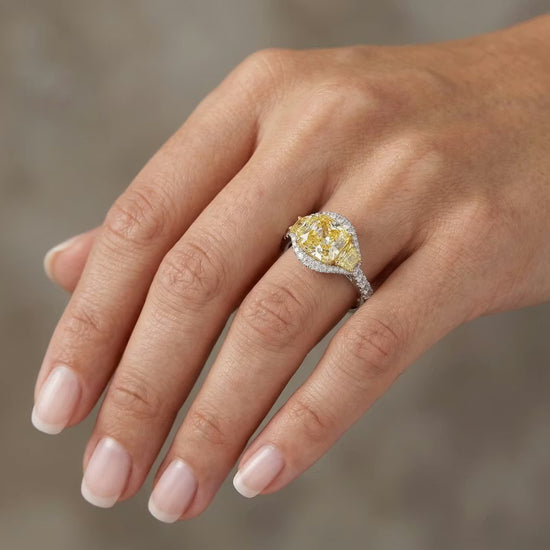 Fancy Yellow Cushion Three-stone Halo Diamond Ring