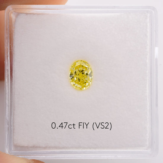 0.47 Carat Fancy Intense Yellow Oval Diamond (VS2) GIA