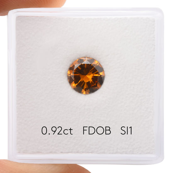 0.92 Carat Fancy Deep Orange Brown Round Brilliant Diamond (SI1) GIA