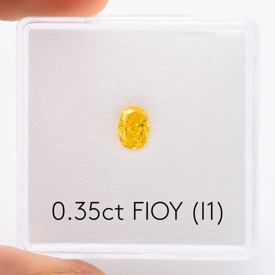 0.35 Carat Fancy Intense Orange Yellow Oval Diamond (I1) GIA