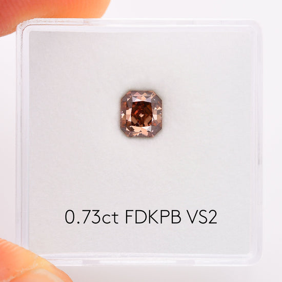 0.73 Carat Fancy Dark Pink Brown Radiant Diamond VS2 GIA