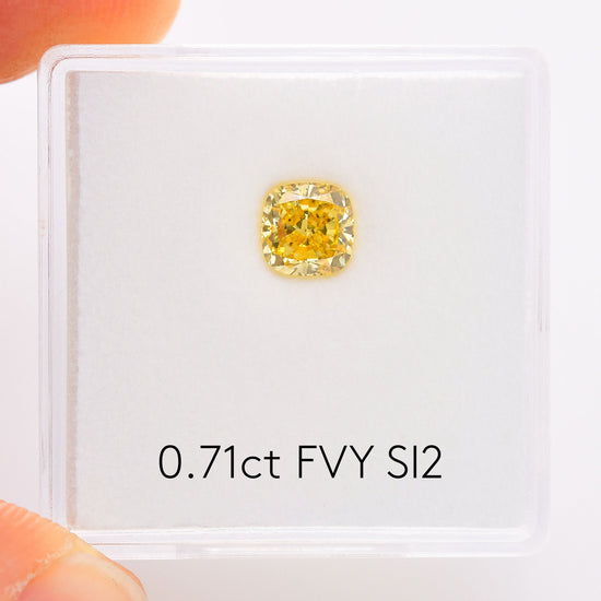 0.71 Carat Fancy Vivid Yellow Cushion Diamond SI2 GIA