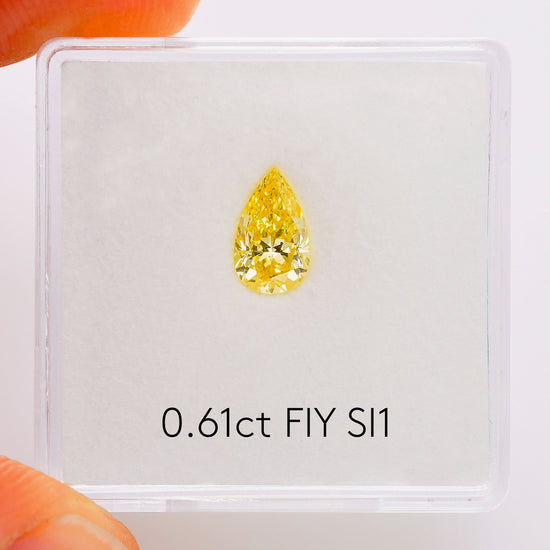 0.61 Carat Fancy Intense Yellow Pear Diamond SI1 GIA