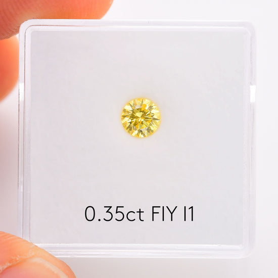 0.35 Carat Fancy Intense Yellow Round Brilliant Diamond I1 GIA