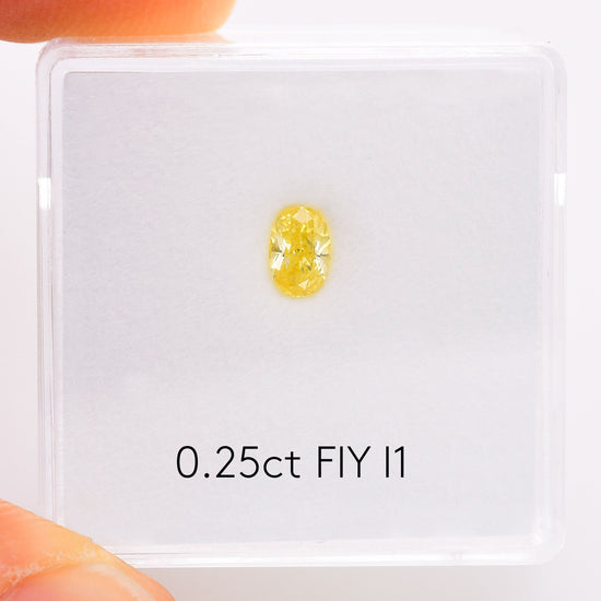 0.25 Carat Fancy Intense Yellow Oval Diamond I1 GIA