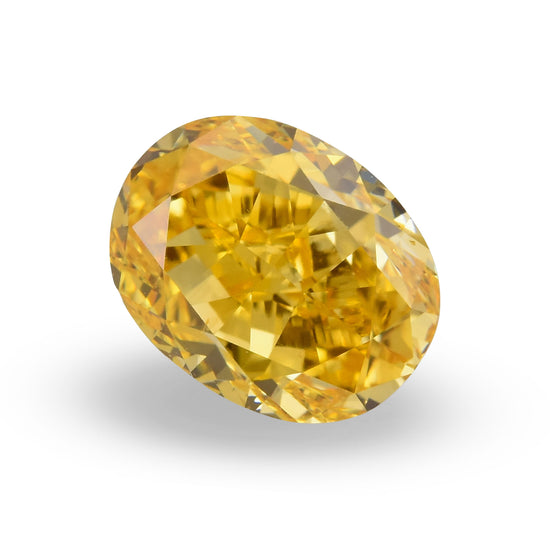 0.57 Carat Fancy Intense Yellow Orange Oval Diamond VS2 GIA