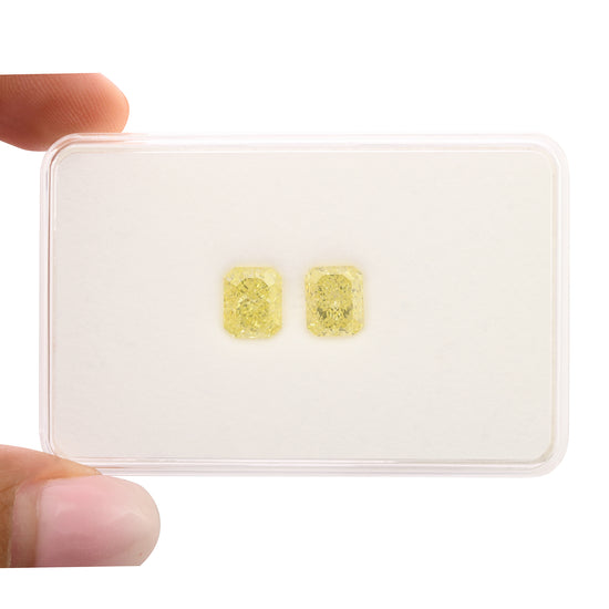 4.03 Carat Fancy Yellow Radiant Diamonds SI1 GIA Pair