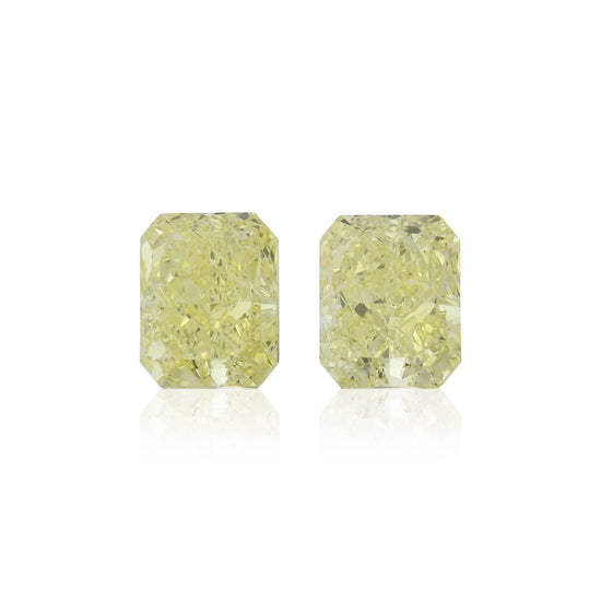 4.07 Carat Fancy Yellow Radiant Diamonds VVS2 GIA Pair