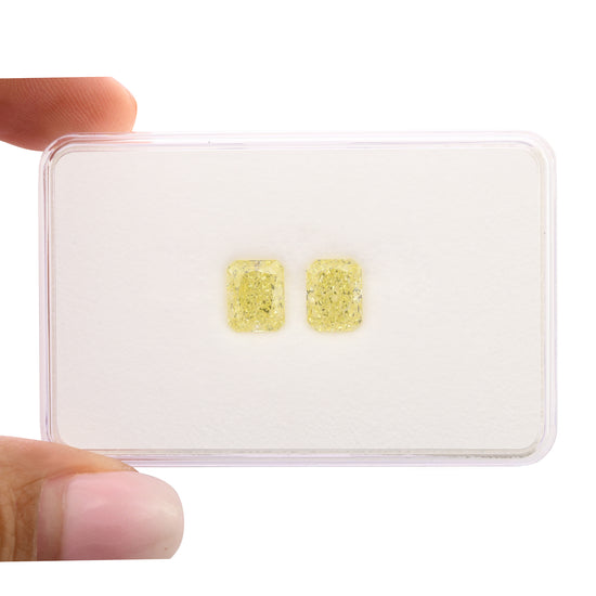 4.08 Carat Fancy Light Yellow Radiant Diamonds VVS2 GIA Pair