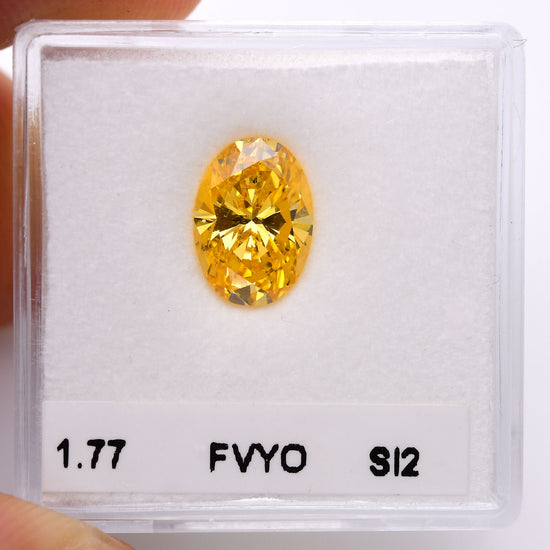 1.77 Carat Fancy Vivid Yellow Orange Oval Diamond SI2 GIA