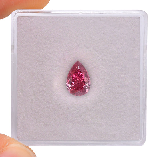 0.70 Carat Fancy Purplish Red Pear Diamond SI1 GIA