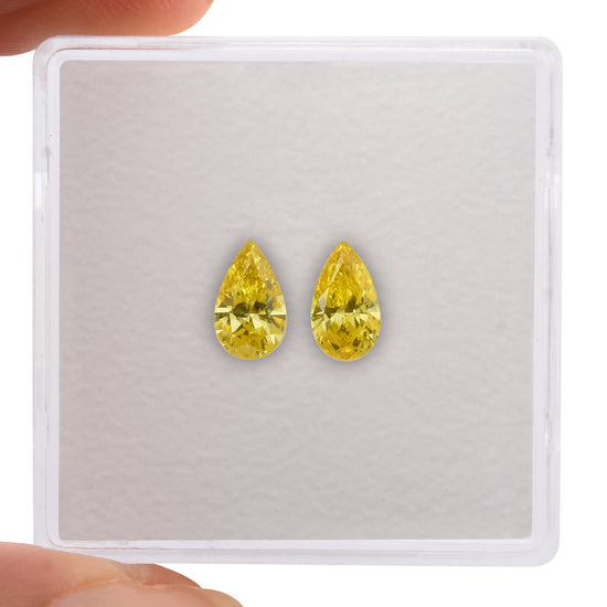0.63 Carat Fancy Vivid Yellow Pear Diamonds VVS2