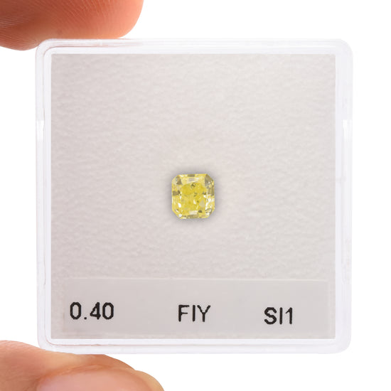 0.40 Carat Fancy Intense Yellow Radiant Diamond SI1 IGI