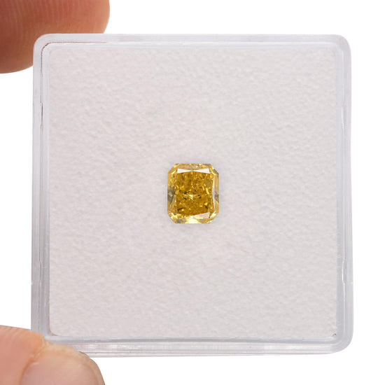 0.63 Carat Fancy Vivid Orangy Yellow Radiant Diamond SI2 GIA