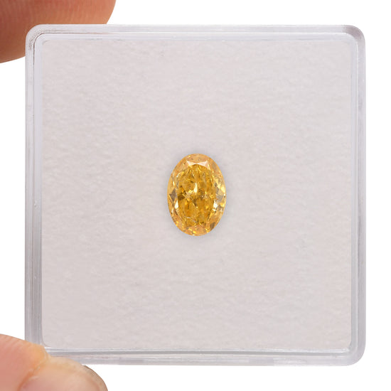 0.68 Carat Fancy Intense Orange Yellow Oval Diamond (SI2) GIA