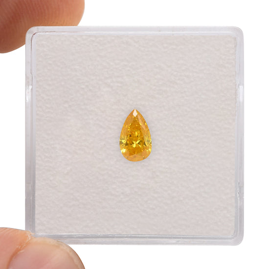 0.55 Carat Fancy Vivid Orange Yellow Pear Diamond I1 GIA