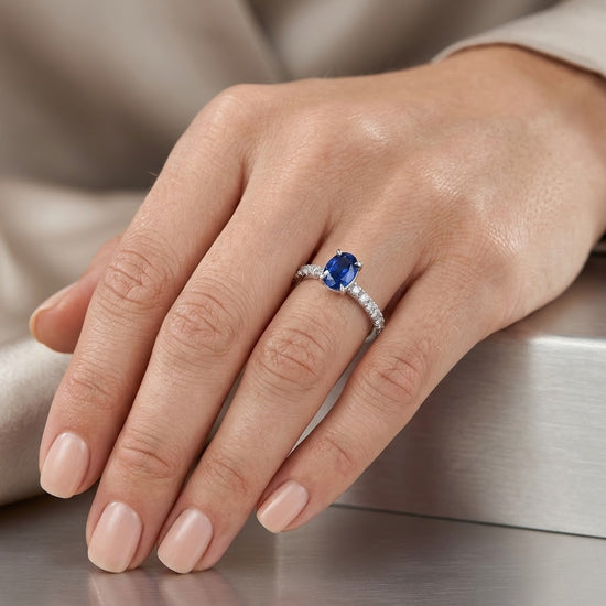 Oval Sapphire Side-stone Diamond Ring