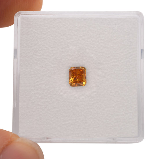 0.50 Carat Fancy Vivid Yellowish Orange Radiant Diamond (SI1) GIA