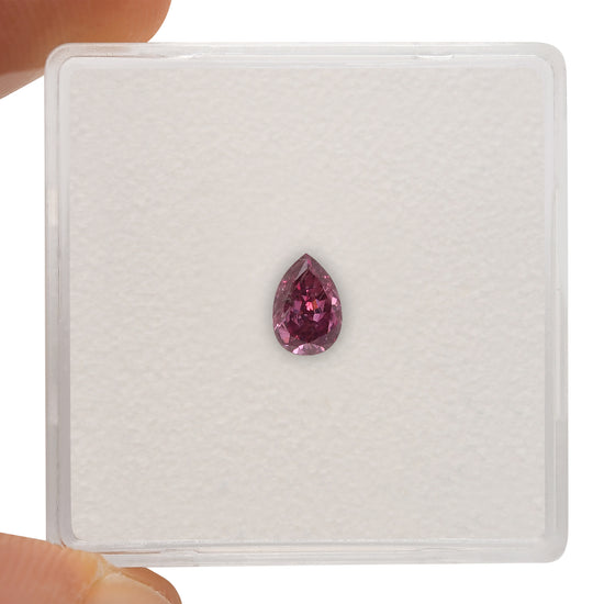0.29 Carat Fancy Purplish Red Pear Diamond (I2) GIA