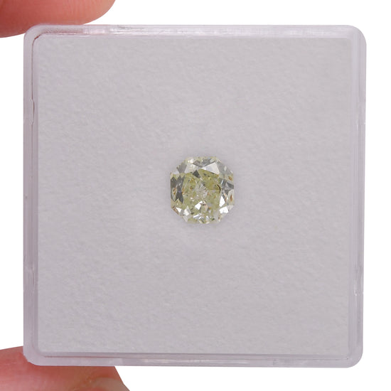 0.76 Carat Light Yellow Green Radiant Diamond I2 GIA