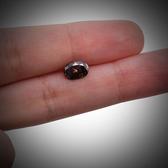Diamante Ovale Fancy Dark Rosso-Marrone (I2) GIA da 1,20 carati
