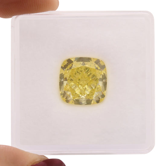 5.11 Carat Fancy Intense Yellow Cushion Diamond VVS2 GIA