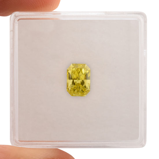 0.91 Carat Fancy Vivid Yellow Radiant Diamond VS2 GIA