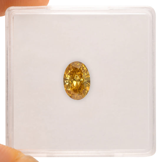 0.77 Carat Fancy Deep Brownish Orangy Yellow Oval Diamond (VS2) GIA
