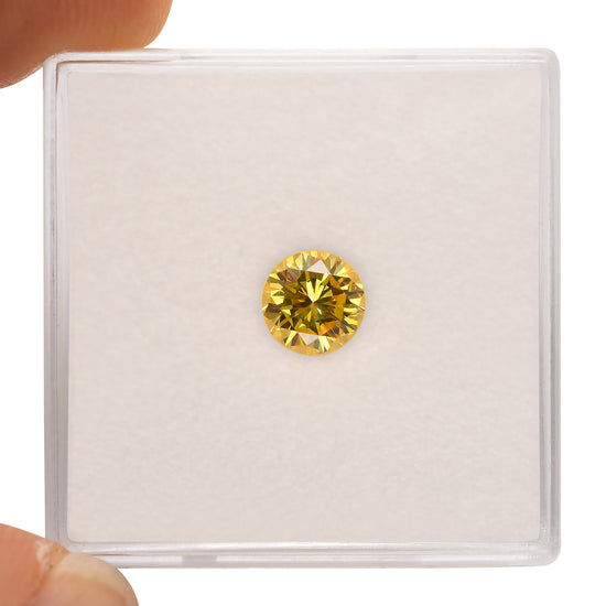 0.71 Carat Fancy Vivid Yellow Round Diamond SI2 GIA