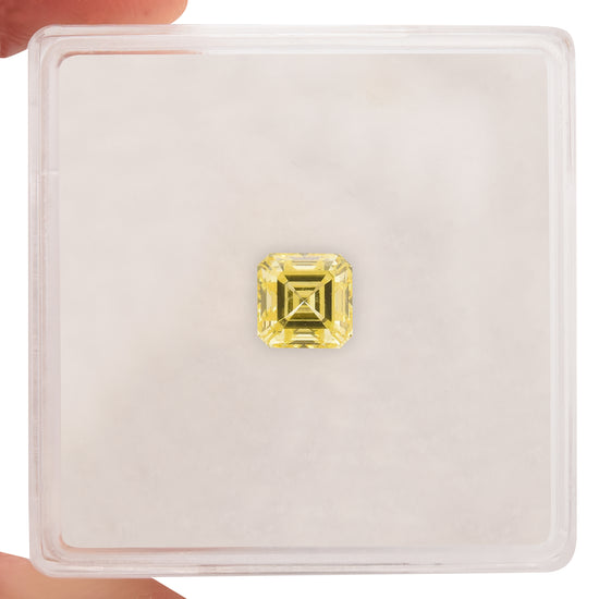 0.73 Carat Fancy Intense Yellow Asscher Diamond SI1 GIA
