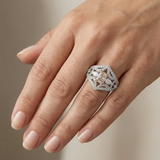 Extraordinary Fancy Light Pink Brown Radiant Diamond Side-stone Ring