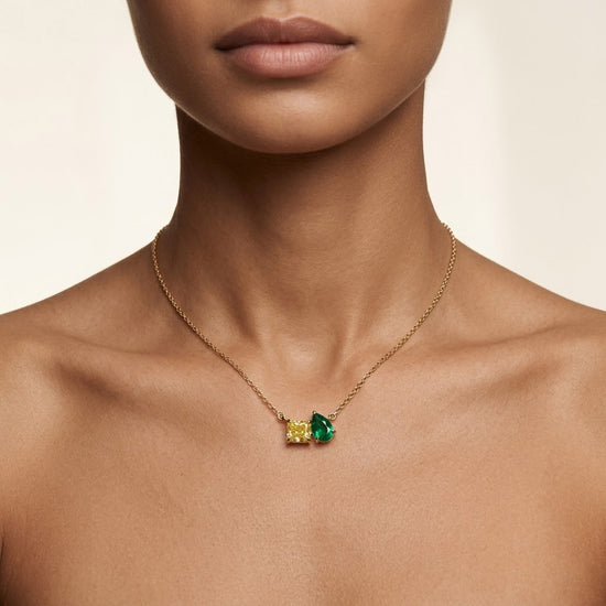 Green Emerald and Fancy Vivid Yellow Diamond Pendant.