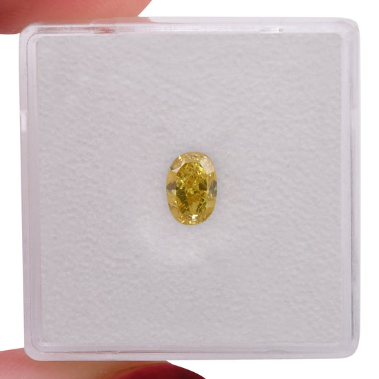 0.70 Carat Fancy Deep Yellow Oval Diamond SI1 GIA