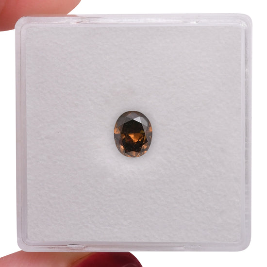 0.54 Carat Fancy Dark Orangy Brown Oval Diamond VS1 GIA