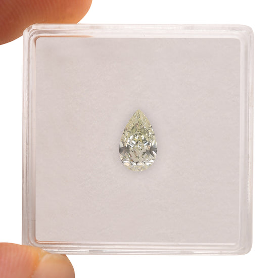 0.70 Carat Light Yellow Green Pear Diamond I1 GIA