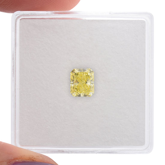 0.76 Carat Fancy Yellow Radiant Diamond SI2 GIA