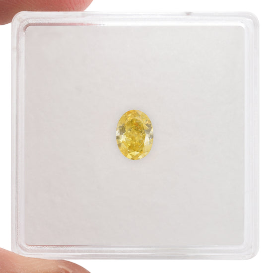 0.51 Carat Fancy Vivid Yellow Oval Diamond (I1) GIA