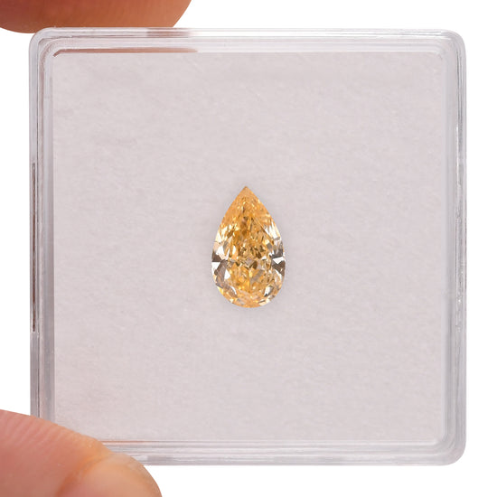 0.60 Carat Fancy Orange Yellow Pear Diamond (VS2) GIA