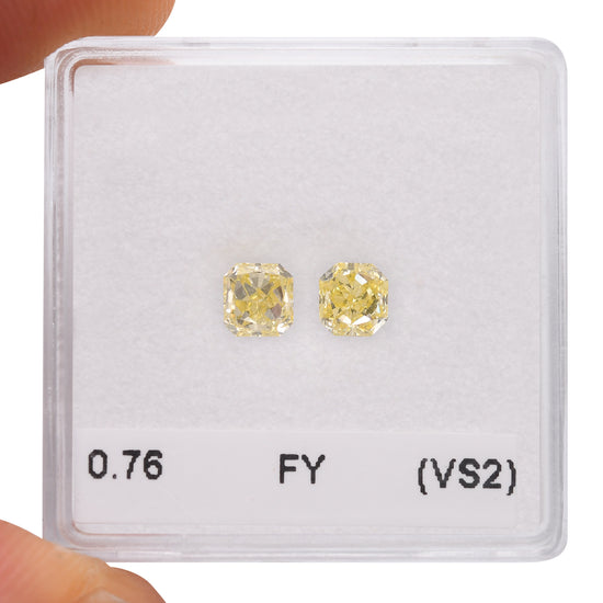 0.76 Carat Fancy Yellow Radiant Diamonds (VS2)
