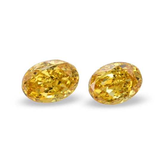 0.55 Carat Fancy Vivid Orangy Yellow Oval Diamonds VS2