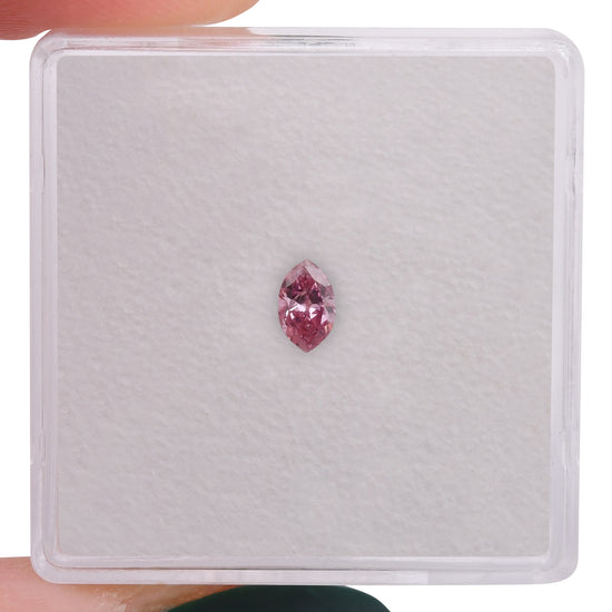 0.15 Carat Fancy Vivid Purplish Pink Marquise Diamond (I2) GIA