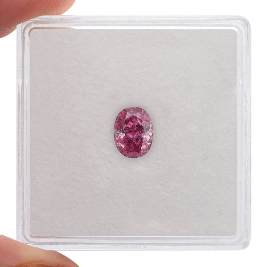 0.75 Carat Fancy Vivid Purplish Pink Oval Diamond SI2 GIA