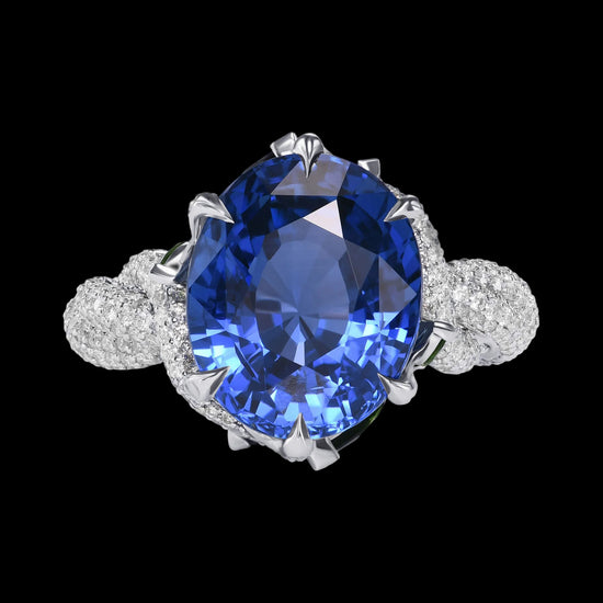 Extraordinary No Heat Oval Sapphire and Diamond Side Stone Ring