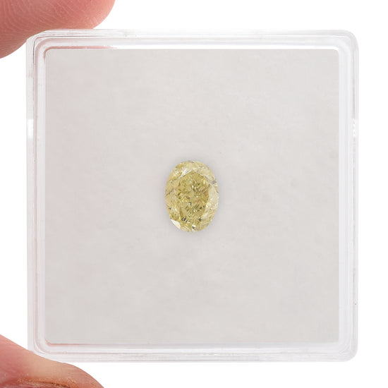 0.71 Carat Fancy Light Brownish Greenish Yellow Oval Diamond SI1 GIA